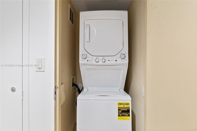 17375 Collins Ave Unit 1908, Sunny Isles Beach, FL 33160 - laundry area featuring stacked washer / dryer