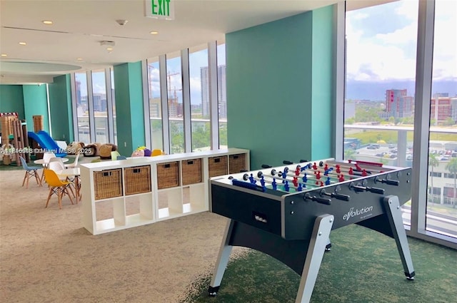 488 NE 18th St Unit 3911, Miami, FL 33132 - game room with carpet, plenty of natural light, a wall of windows, and a view of city