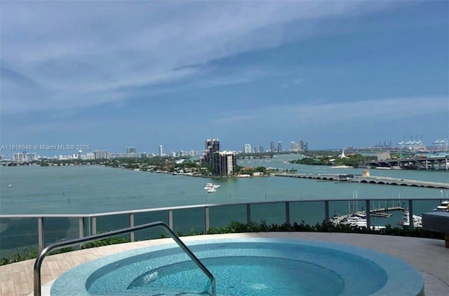 488 NE 18th St Unit 3911, Miami, FL 33132 - view of pool with a skyline view, a water view, and a community hot tub