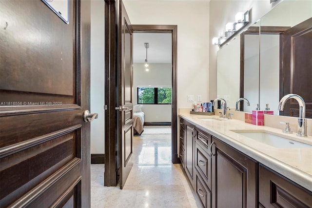 18825 N Bay Rd, Sunny Isles Beach, FL 33160 - ensuite bathroom with double vanity and tile patterned flooring