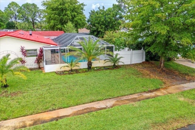 400 NW 41st Ave, Coconut Creek, FL 33066 - view of yard featuring glass enclosure