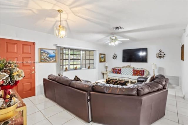 400 NW 41st Ave, Coconut Creek, FL 33066 - living area with light tile patterned flooring and ceiling fan