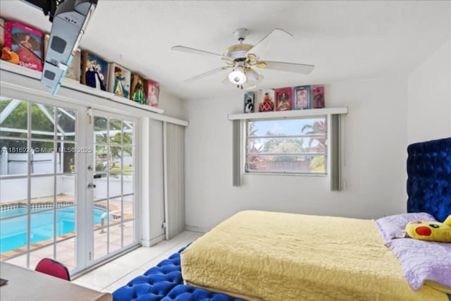 400 NW 41st Ave, Coconut Creek, FL 33066 - bedroom with access to exterior, tile patterned flooring, and a ceiling fan