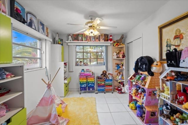 400 NW 41st Ave, Coconut Creek, FL 33066 - recreation room with tile patterned floors and ceiling fan