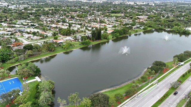 400 NW 41st Ave, Coconut Creek, FL 33066 - aerial view of property and surrounding area featuring a nearby body of water