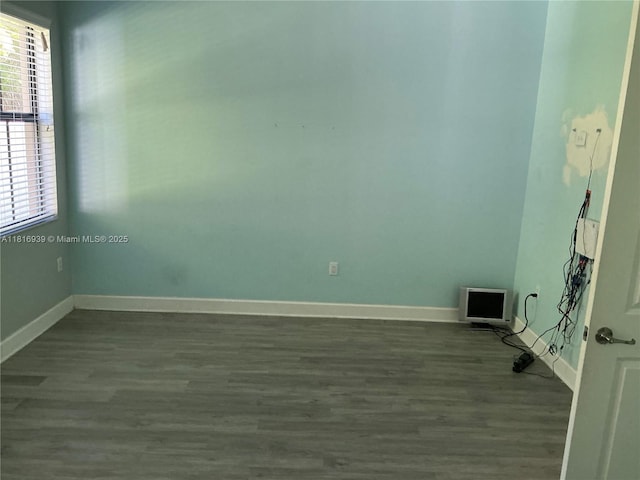 5220 NW 48th Ln, Tamarac, FL 33319 - unfurnished room with dark wood-style floors and baseboards