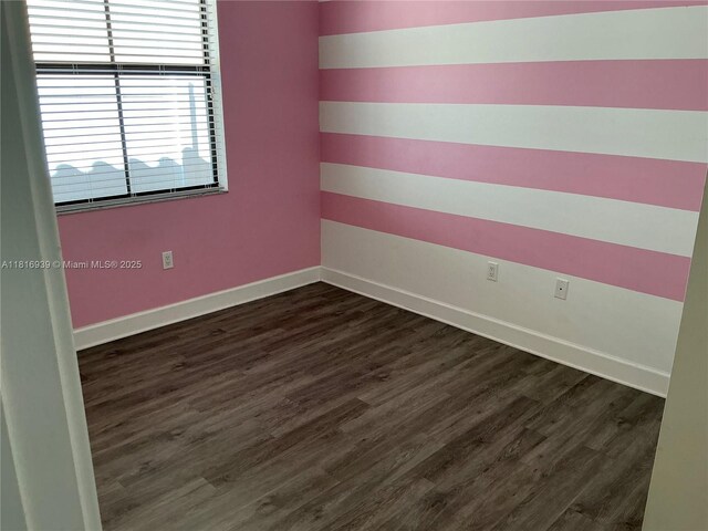 5220 NW 48th Ln, Tamarac, FL 33319 - unfurnished room with dark wood-type flooring