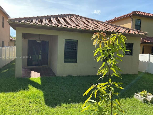 5220 NW 48th Ln, Tamarac, FL 33319 - back of property with stucco siding and a tiled roof