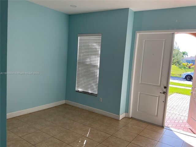 5220 NW 48th Ln, Tamarac, FL 33319 - tiled foyer entrance with baseboards