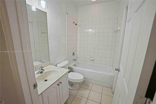 1959 SW 60th Ave, North Lauderdale, FL 33068 - bathroom with toilet, vanity, bathtub / shower combination, tile patterned floors, and a textured wall