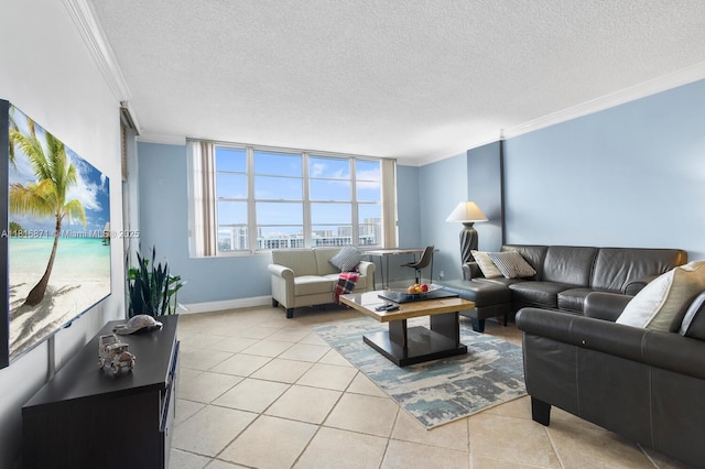 3725 S Ocean Dr Unit 1224, Hollywood, FL 33019 - living area with ornamental molding, light tile patterned flooring, a textured ceiling, and baseboards
