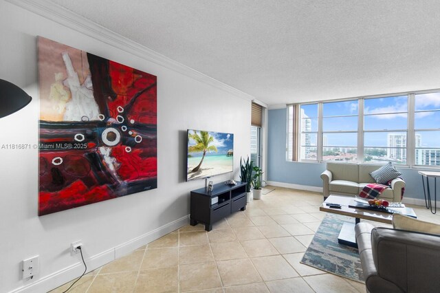 3725 S Ocean Dr Unit 1224, Hollywood, FL 33019 - living room with crown molding, baseboards, tile patterned floors, and a textured ceiling