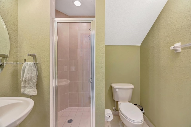 14521 SW 29th Ter Unit 14521, Miami, FL 33175 - bathroom with a shower stall, a textured wall, and tile patterned floors