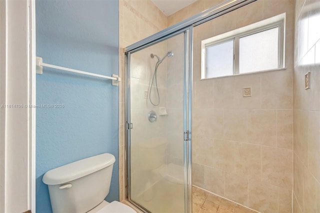 14521 SW 29th Ter Unit 14521, Miami, FL 33175 - full bath with healthy amount of natural light, a shower stall, and a textured wall