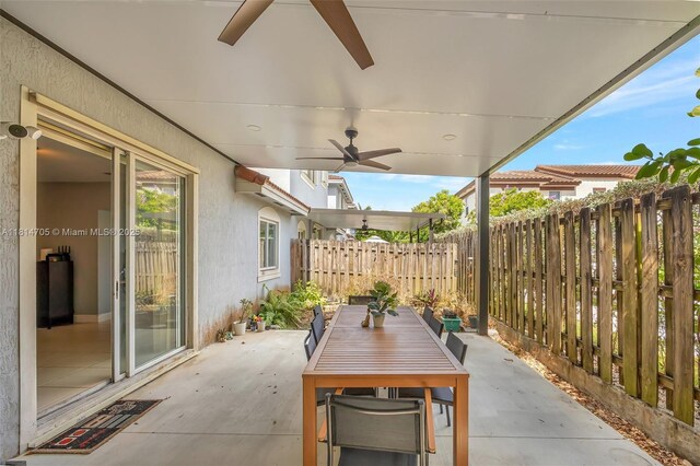 14521 SW 29th Ter Unit 14521, Miami, FL 33175 - view of patio / terrace featuring a ceiling fan and outdoor dining space