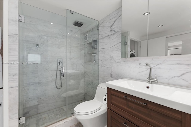 401 Ocean Dr Unit 221, Miami Beach, FL 33139 - full bath with vanity, a marble finish shower, toilet, tile walls, and recessed lighting
