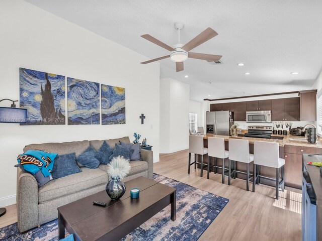 18424 NW 21st St, Pembroke Pines, FL 33029 - living room with light wood-style flooring, a ceiling fan, and recessed lighting