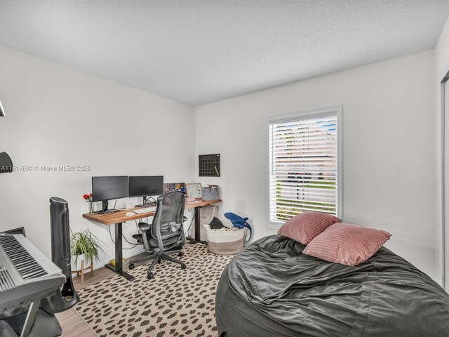 18424 NW 21st St, Pembroke Pines, FL 33029 - bedroom with an office area and wood finished floors