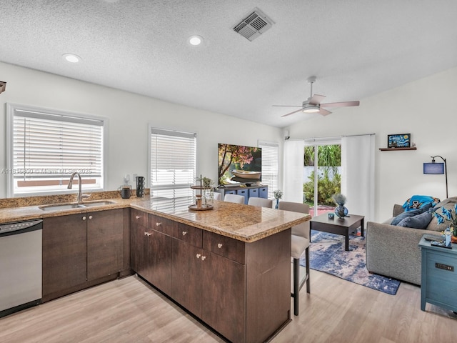 18424 NW 21st St, Pembroke Pines, FL 33029 - kitchen with a sink, stainless steel dishwasher, light wood-style flooring, a peninsula, and a ceiling fan