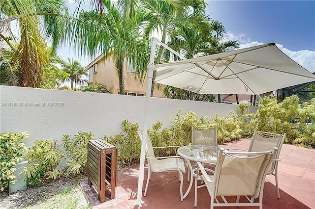 18424 NW 21st St, Pembroke Pines, FL 33029 - fenced backyard featuring outdoor dining space and a patio