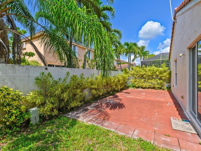 18424 NW 21st St, Pembroke Pines, FL 33029 - fenced backyard with a patio area