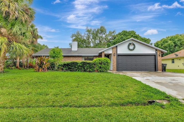 717 SW Aster Rd, Port St Lucie, FL 34953 - view of front of house featuring concrete driveway, an attached garage, and a front yard
