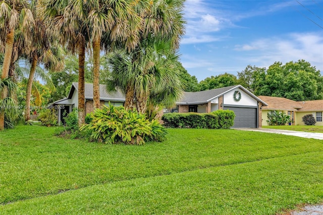 717 SW Aster Rd, Port St Lucie, FL 34953 - view of front of house with an attached garage, concrete driveway, a front lawn, and stucco siding