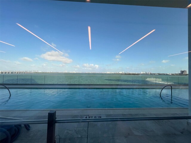 700 NE 26th Ter Unit 2004, Miami, FL 33137 - view of pool featuring a water view