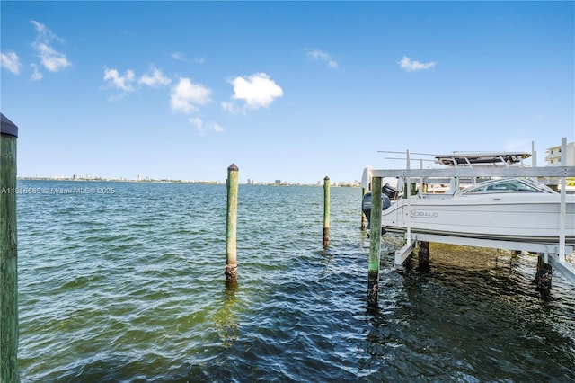 1000 Quayside Ter Unit 1107, Miami, FL 33138 - dock area featuring boat lift and a water view