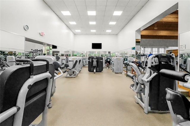 1000 Quayside Ter Unit 1107, Miami, FL 33138 - exercise room featuring a paneled ceiling and a high ceiling