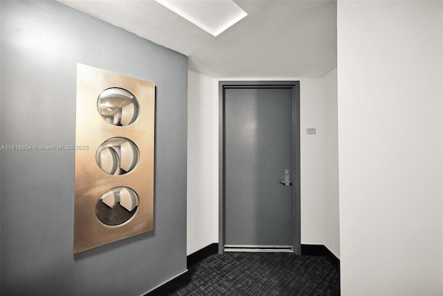 41 SE 5th St Unit 517, Miami, FL 33131 - foyer entrance featuring dark colored carpet and baseboards