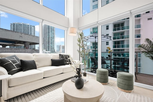41 SE 5th St Unit 517, Miami, FL 33131 - living area with a city view and a towering ceiling