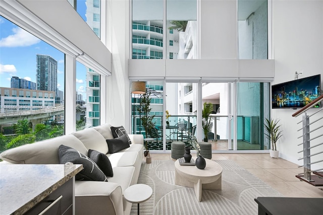 41 SE 5th St Unit 517, Miami, FL 33131 - tiled living area featuring a high ceiling and a view of city