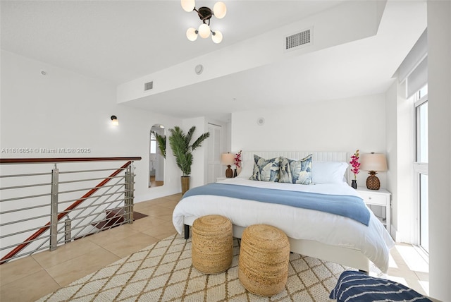 41 SE 5th St Unit 517, Miami, FL 33131 - tiled bedroom featuring multiple windows
