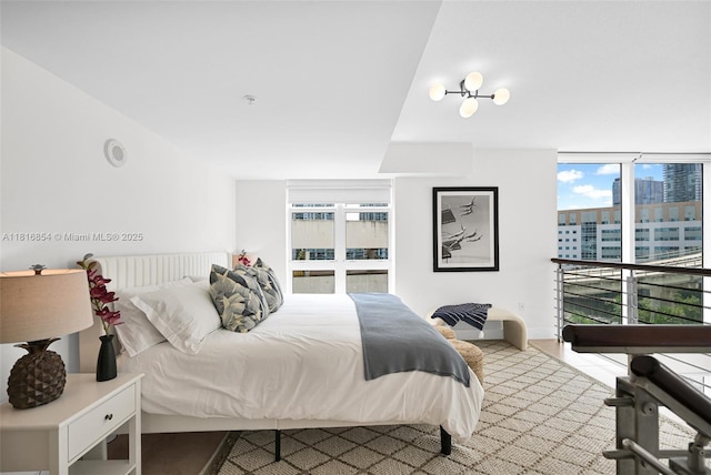 41 SE 5th St Unit 517, Miami, FL 33131 - bedroom featuring multiple windows and a view of city