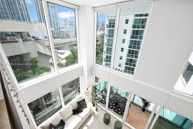 41 SE 5th St Unit 517, Miami, FL 33131 - sunroom / solarium featuring a city view, a water view, healthy amount of natural light, and a towering ceiling