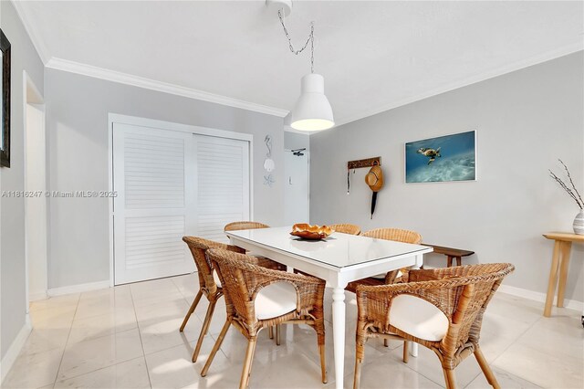4250 Galt Ocean Dr Unit 7D, Fort Lauderdale, FL 33308 - dining area with ornamental molding and baseboards