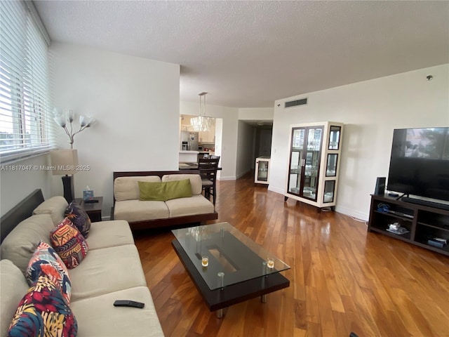 6422 Collins Ave Unit 501, Miami Beach, FL 33141 - living area featuring wood finished floors and baseboards