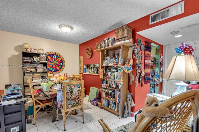 8635 NW 8th St Unit 104, Miami, FL 33126 - office area with a textured ceiling and tile patterned floors
