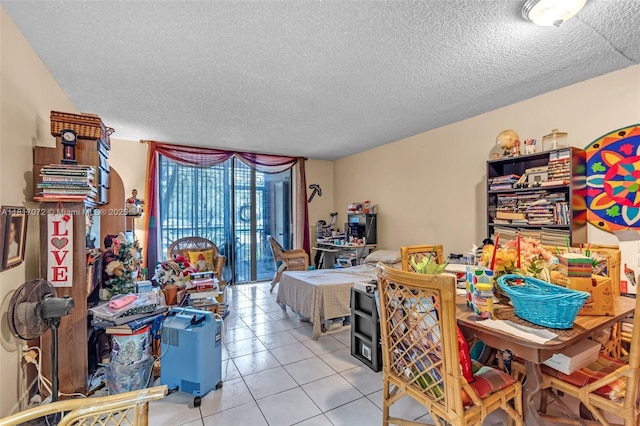 8635 NW 8th St Unit 104, Miami, FL 33126 - dining space featuring light tile patterned flooring and a textured ceiling