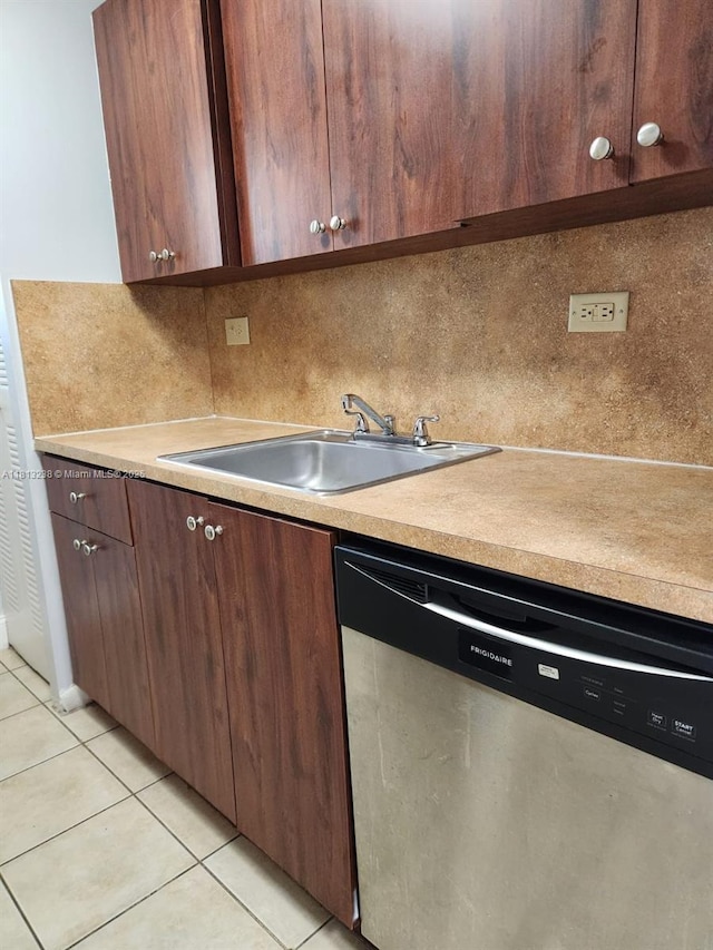 7095 NW 179th St Unit 206, Hialeah, FL 33015 - kitchen featuring dishwasher, light tile patterned floors, a sink, and light countertops