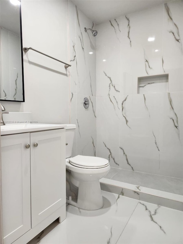 7095 NW 179th St Unit 206, Hialeah, FL 33015 - full bath with vanity, a marble finish shower, toilet, and marble look tiles
