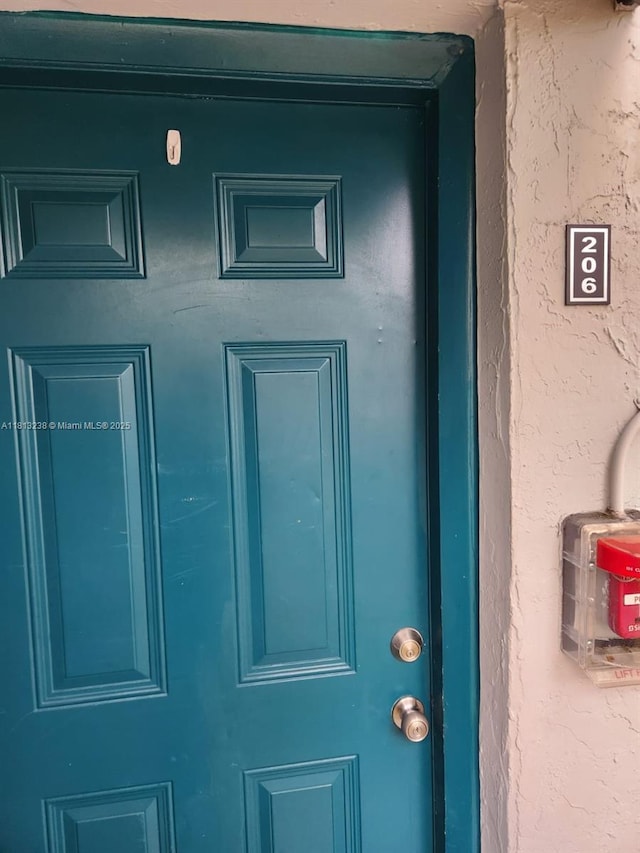 7095 NW 179th St Unit 206, Hialeah, FL 33015 - entrance to property with stucco siding