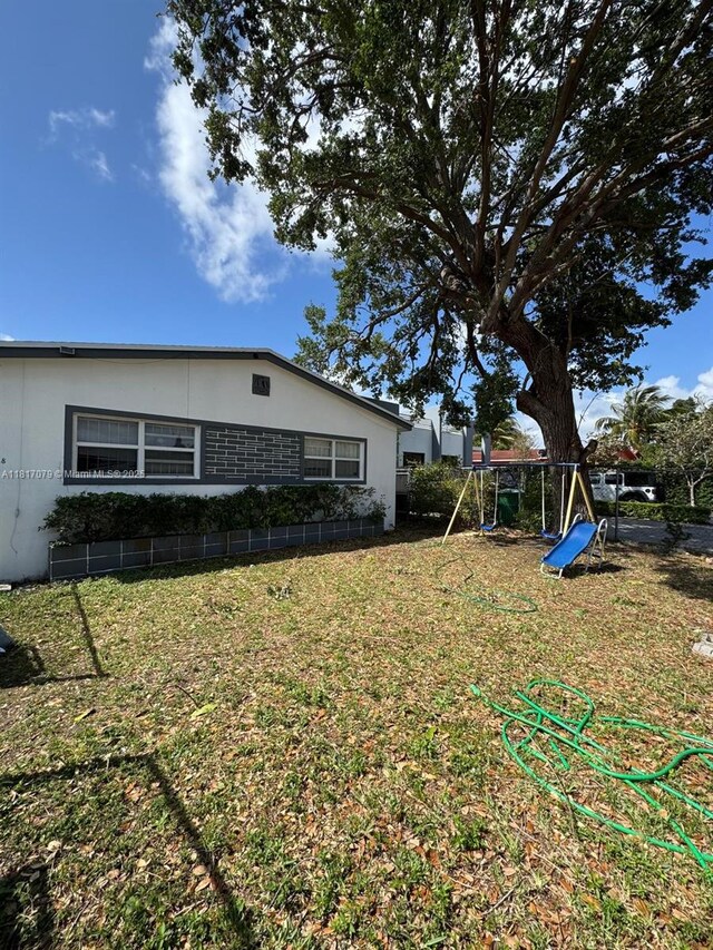 1226 NE 112th St, Miami, FL 33161 - view of yard featuring a playground