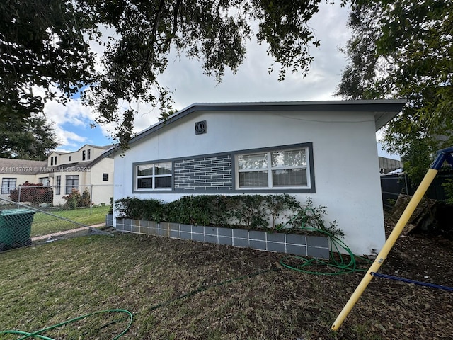 1226 NE 112th St, Miami, FL 33161 - view of side of property with stucco siding