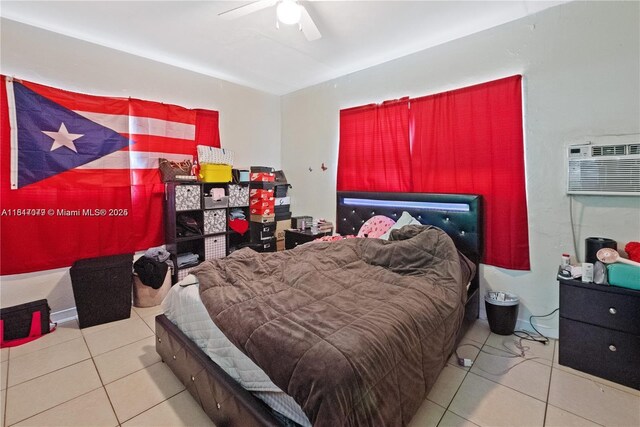 1226 NE 112th St, Miami, FL 33161 - bedroom featuring a wall unit AC, tile patterned floors, and ceiling fan