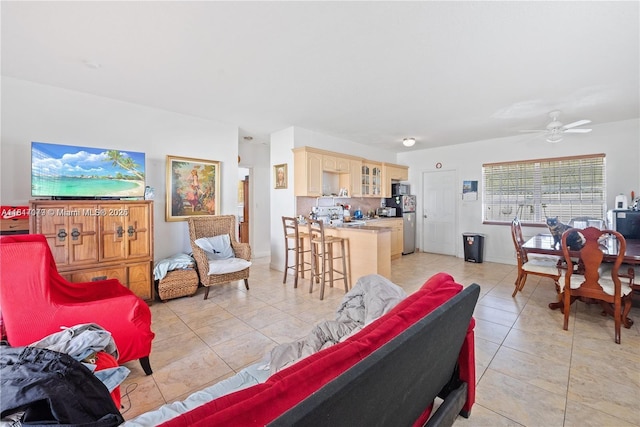 1226 NE 112th St, Miami, FL 33161 - living area featuring light tile patterned floors and a ceiling fan