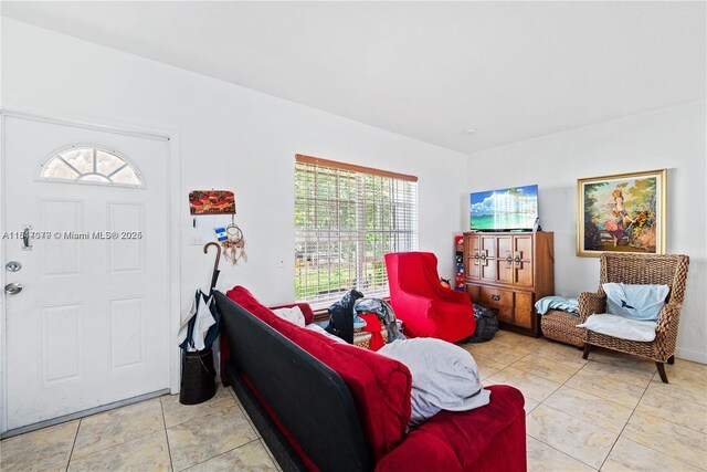 1226 NE 112th St, Miami, FL 33161 - living room featuring light tile patterned floors