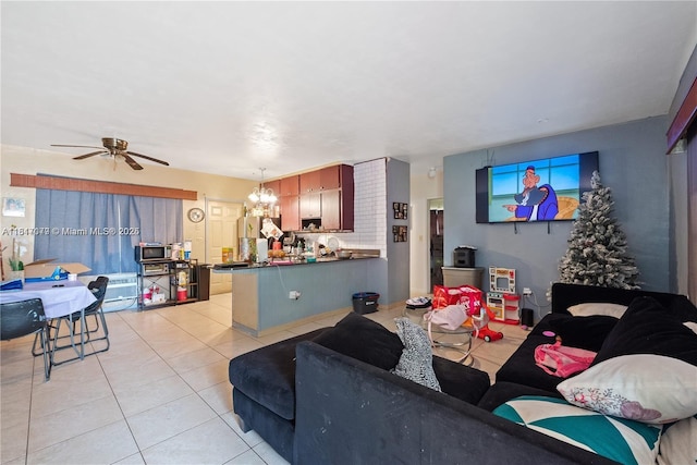 1226 NE 112th St, Miami, FL 33161 - living area with light tile patterned floors, a chandelier, and a ceiling fan