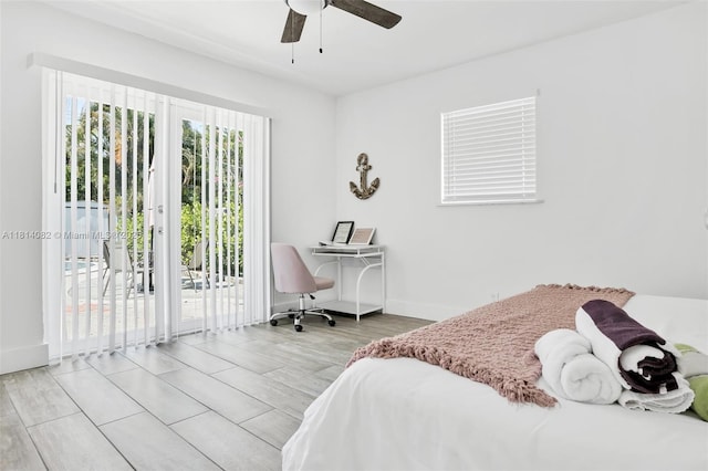 1547 NE 38th St, Oakland Park, FL 33334 - bedroom with access to exterior, baseboards, and ceiling fan